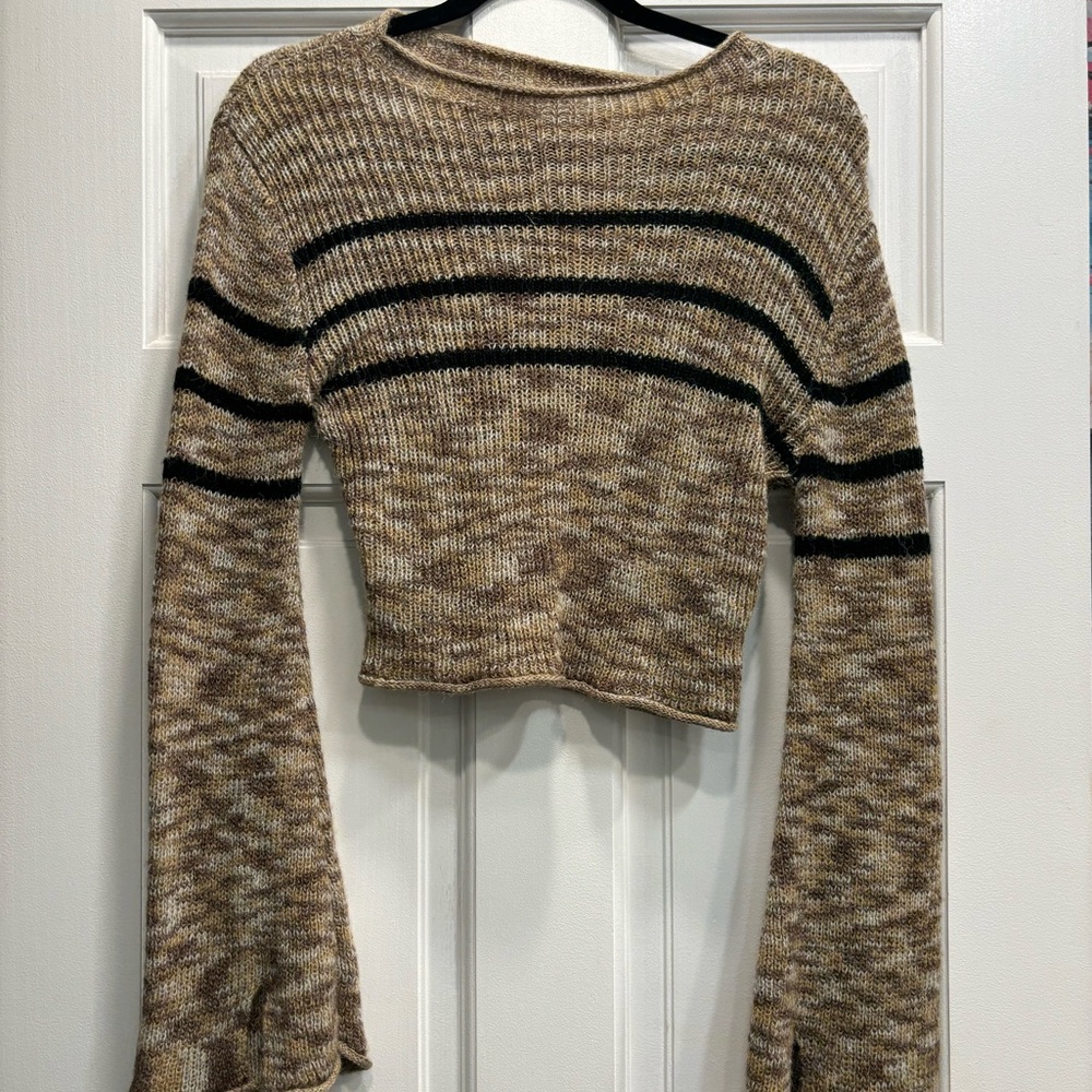 Knitted brown shirt either black stripes as well as flared opening sleeves